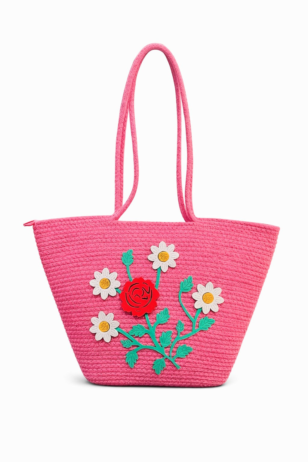 Jutepie pink woven tote bag with floral embroidery featuring a red rose and white daisies, shoulder straps and zip.